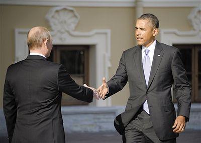 ���գ����_˹���y(t��ng)�վ��ڿ�˹̹���m��ӭ�Ӆ���G20���(hu��)������(gu��)���y(t��ng)�W���R������΢Ц���֡�